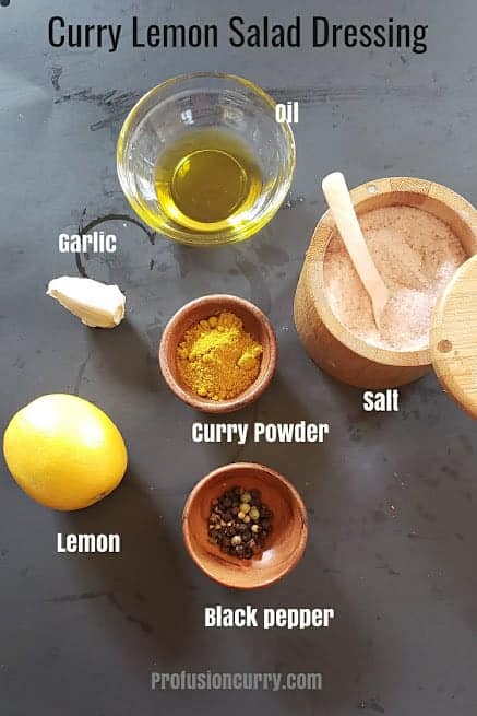 Ingredients used in making curry lemon salad dressing.