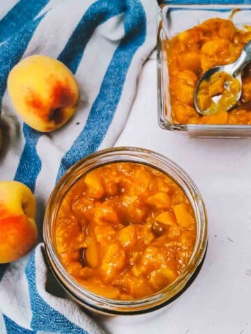 Peach Chutney made with just 5 ingredients is delicious and sugar free condiment. This vegan and gluten-free peach chutney is perfect for preserving summer fruit.