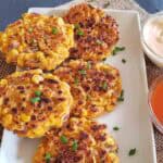 Crispy golden air fryer corn fritters made with chickpea flour are served for vegan and gluten-free appetizer.