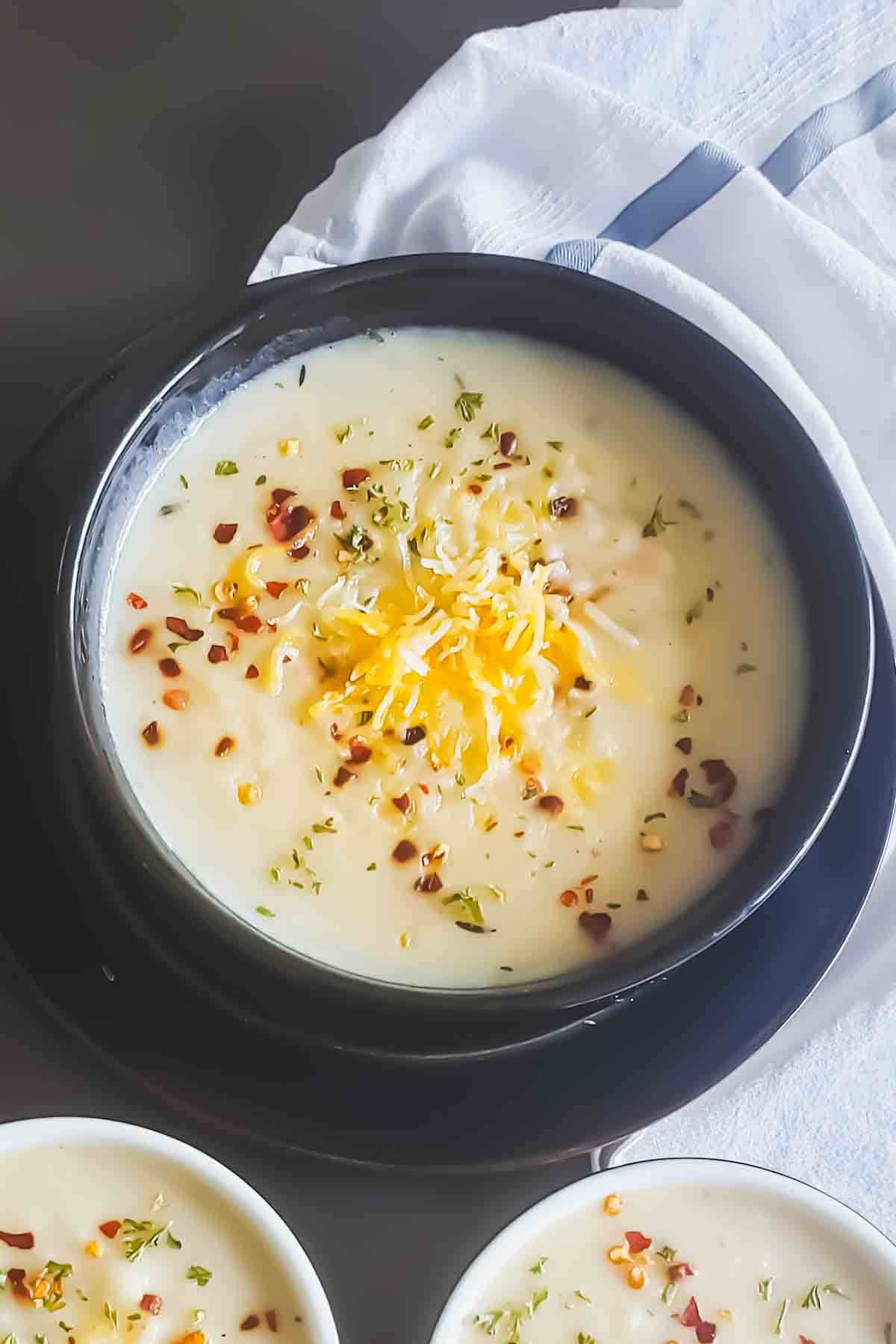 A bowl of creamy potato soup served for hearty comforting dinner.