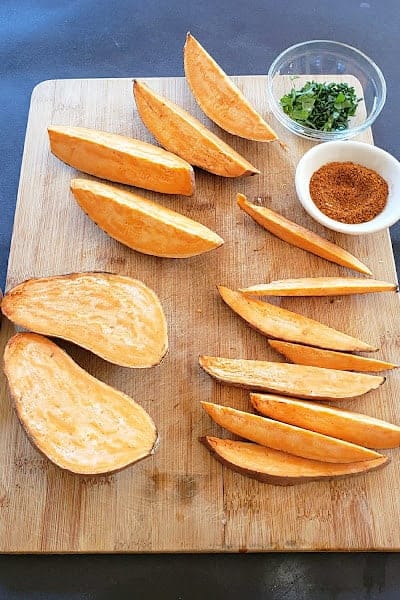 How to cut sweet potato into eight wedges.