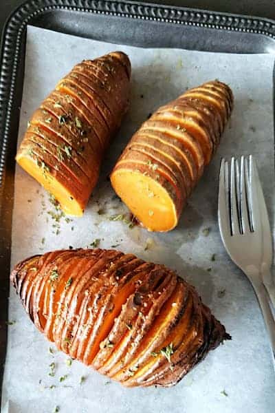 A dinner side dish serving of sweet potatoes.