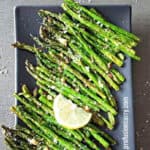 Pinterest image with text overlay for roasted asparagus made in air fryer.