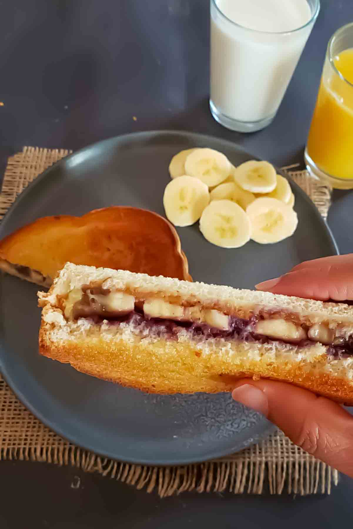 Showing three different layers of ingredients in the sandwich.