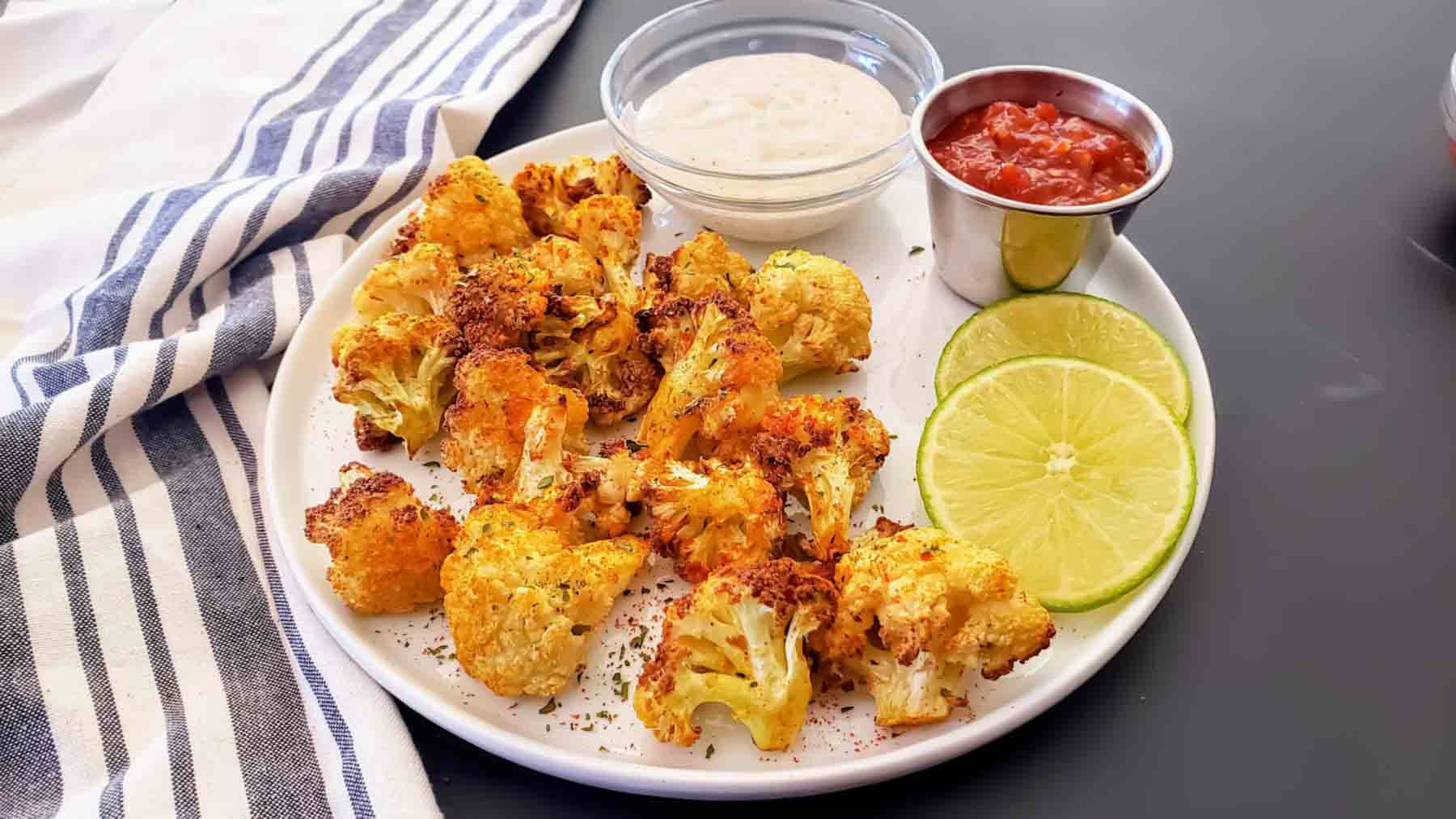 Vegan and gluten-free air fryer curry cauliflower served.