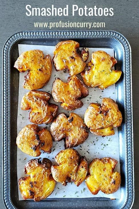 Pinterest image with text overlay for smashed potatoes made in air fryer or oven.