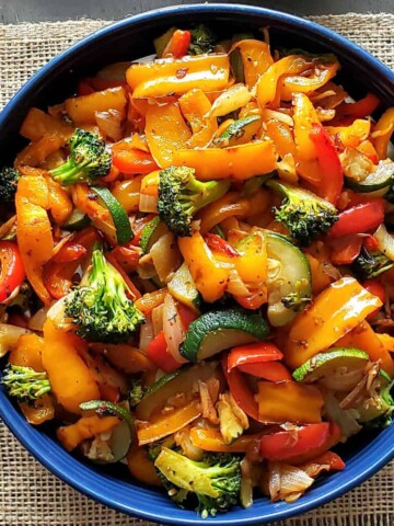 Air fryer vegetables seasoned and roasted served fr dinner side dish.