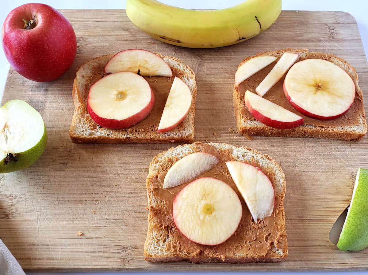 Banana Peanut Butter Sandwich with apples and pears.