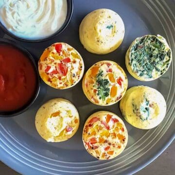 Air fryer egg bites with cottage cheese served with dipping sauce.