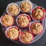 Eight apple muffins arranged on the serving platter.