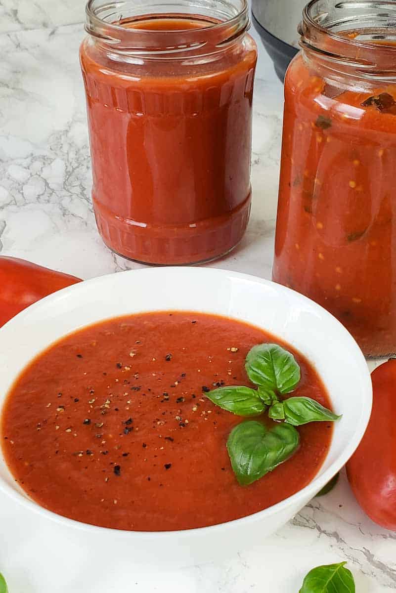 A bowl full of rich and delicious Instant Pot spaghetti sauce made with fresh garden tomatoes. 