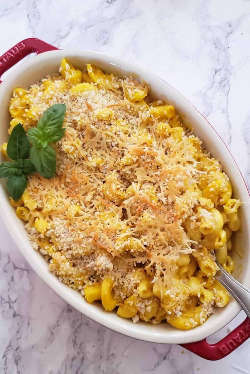 A casserole with pumpkin mac and cheese bake