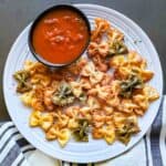 Crispy Air Fryer Pasta Chips served with dip.