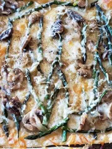 Baked asparagus tart with flaky buttery crust.