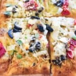 Crispy baked Greek Pizza made at home.