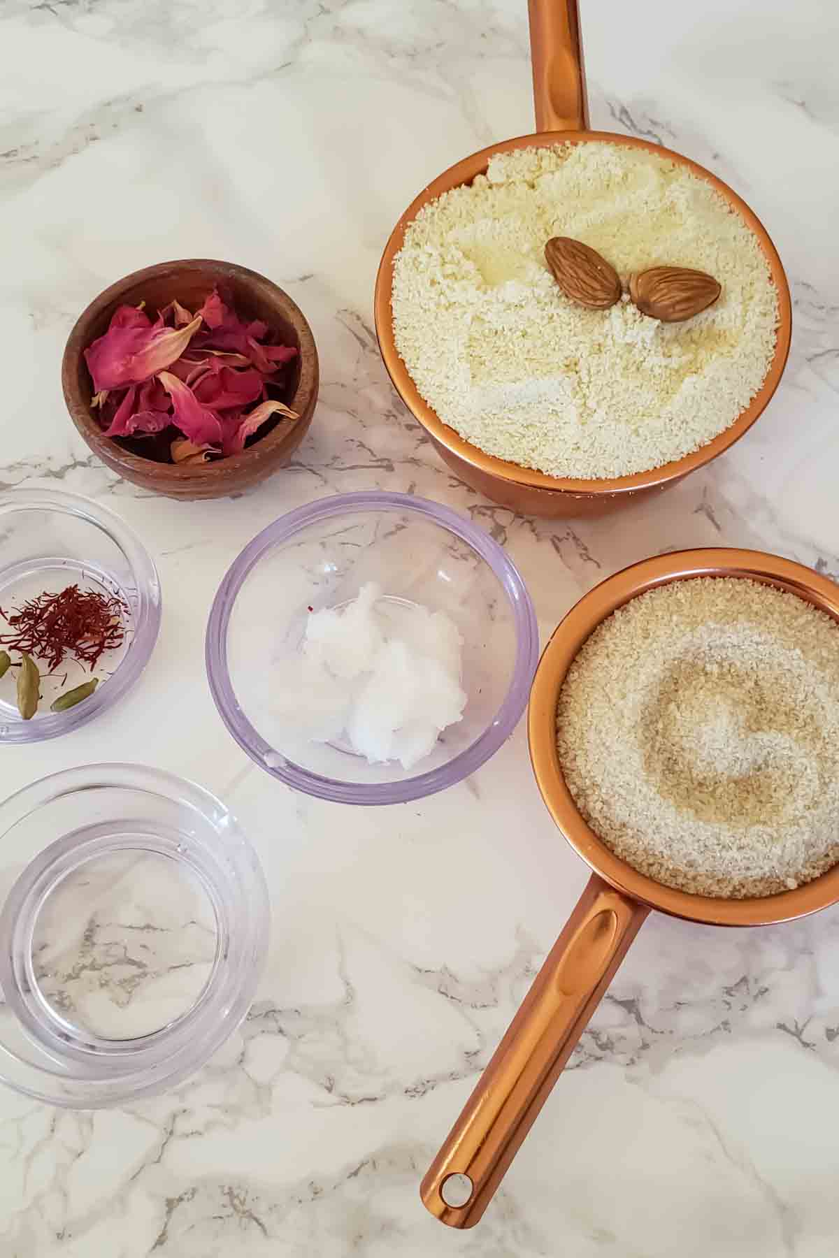 Ingredients used in making gluten free and vegan badam burfi also called badam katli or almond burfi.