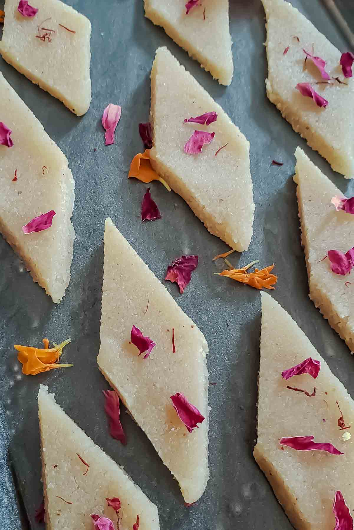 Close up image of smooth fudge like homemade badam burfi.
