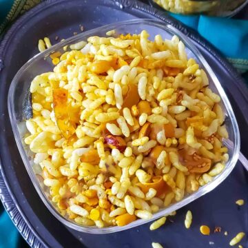 Showing vibrant golden hued turmeric spiced Kolhapuri Bhadang served in a bowl.