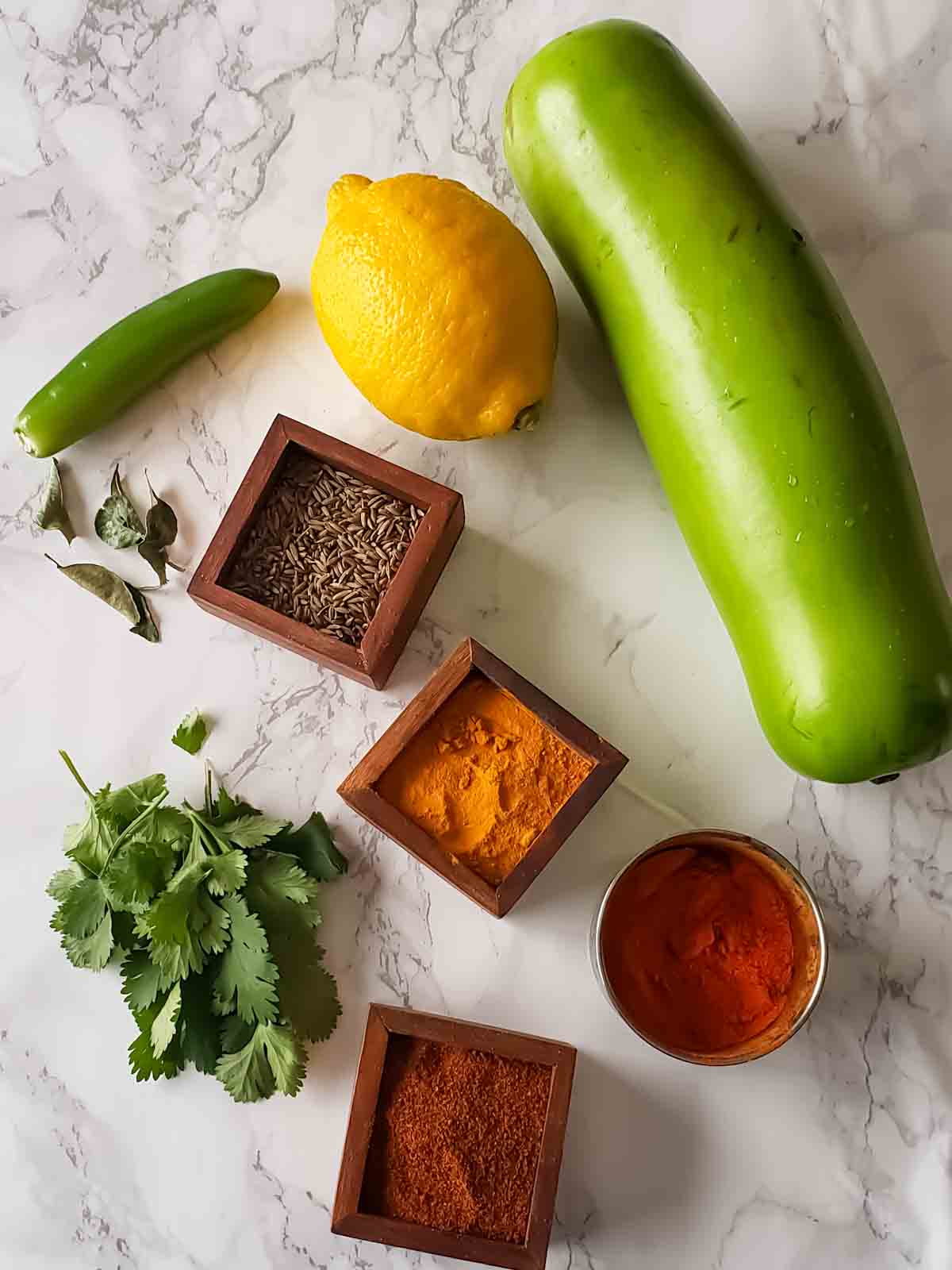 Ingredients used in making vegan and gluten free dudhi chi bhaji aka lauki sabji.