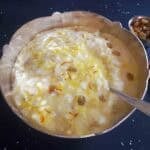 Coconut milk kheer is a rich, creamy, and naturally dairy-free Indian rice pudding made by simmering rice with coconut milk, sugar, and aromatic spices.