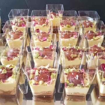 Showing decadent texture of Indian fusion dessert called gulab jamun trifle, which is a layered dessert with gulab jamun and custard.