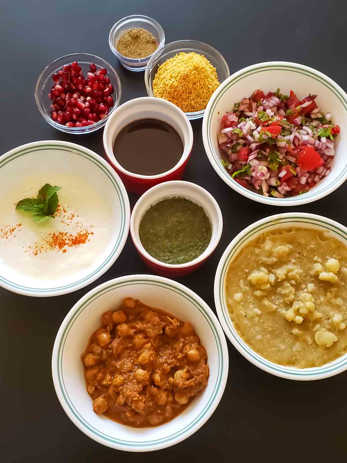 Ingredients used in making 7-layer Indian dip which is fusion Indo-Mexican recipe.