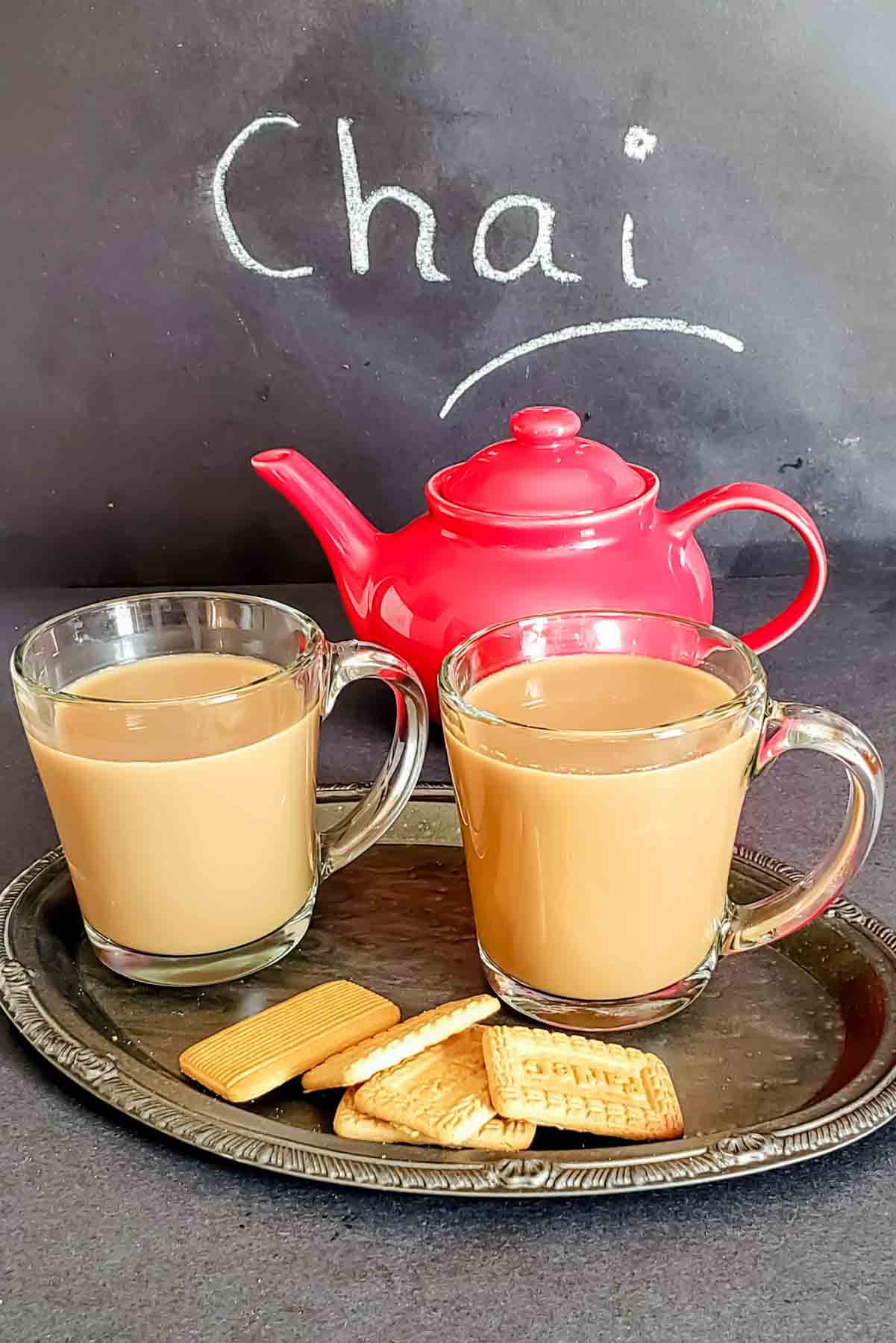 Masala chai which is spiced Indian tea served in a kettle.