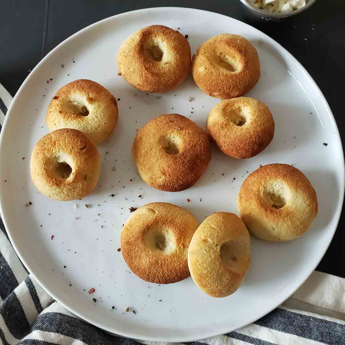 2-ingredient bagel bites with Greek yogurt and almond flour, served on a plate for a satisfying low-carb, high protein breakfast or snack.