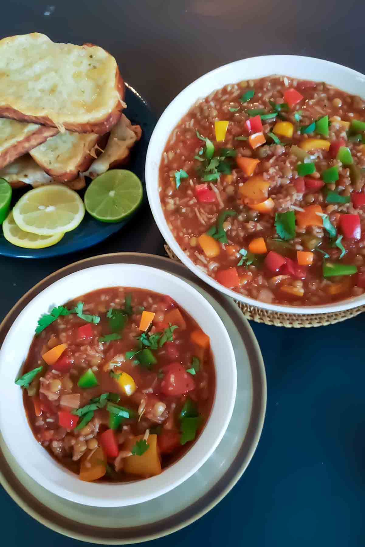 A dinner serving with vegan bell pepper soup which is deconstructed version of stuffed peppers.