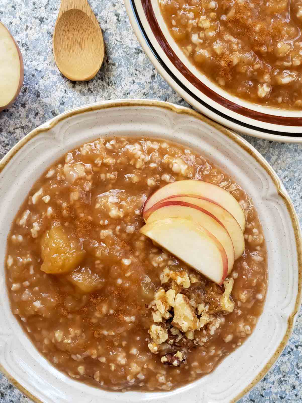A bowl full of nourishing apple pie oatmeal for healthy breakfast made in Instant Pot.