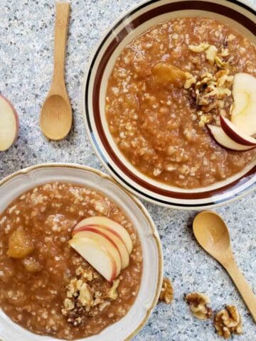 Apple pie oatmeal made with wholesome clean ingredients served with toppings for nourishing breakfast.