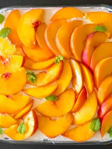 Summer peach cheesecake made with cream cheese and ripe peaches.