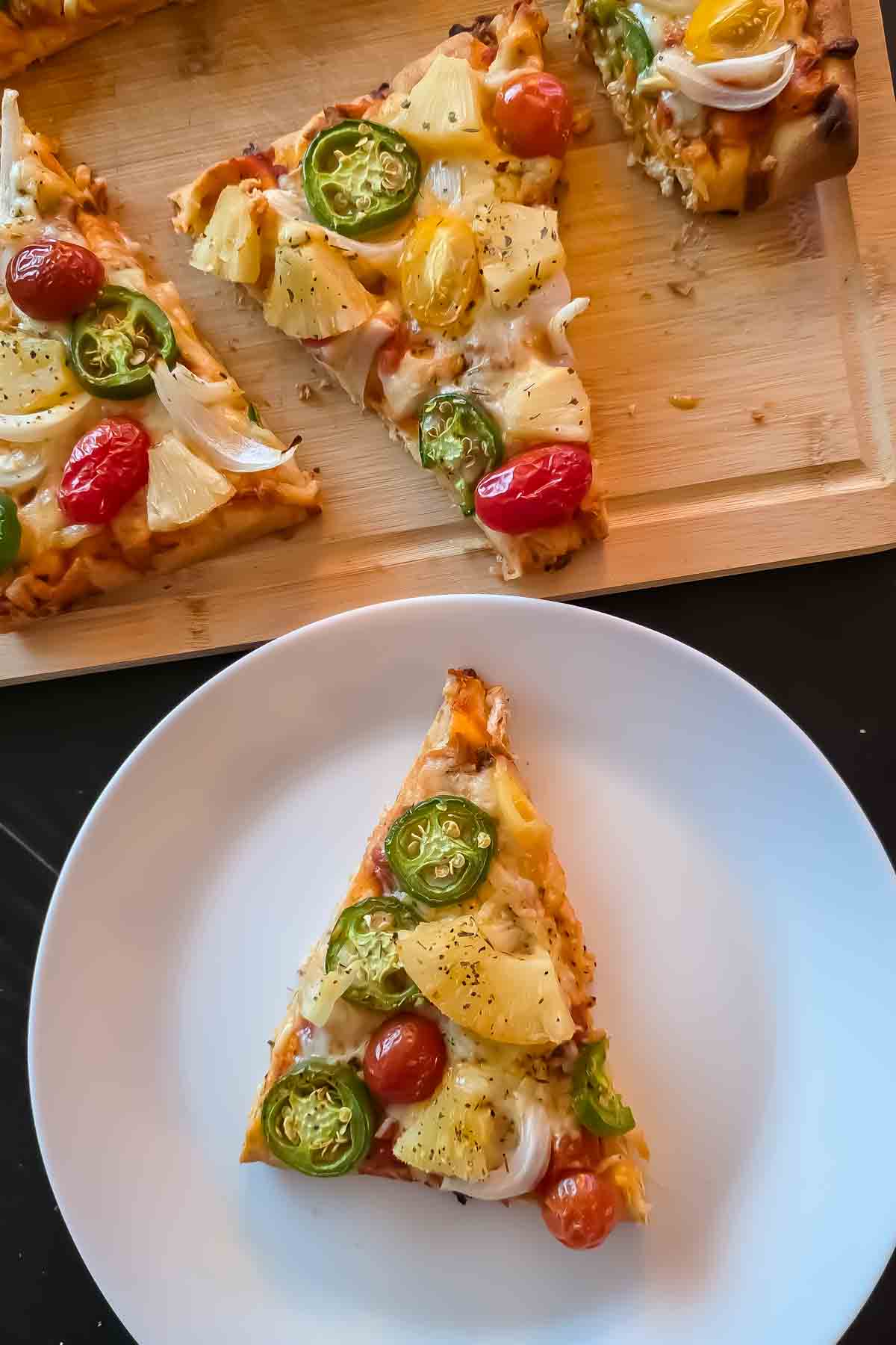 Homemade pineapple flatbread pizza sliced and served as a quick 15-minute appetizer.