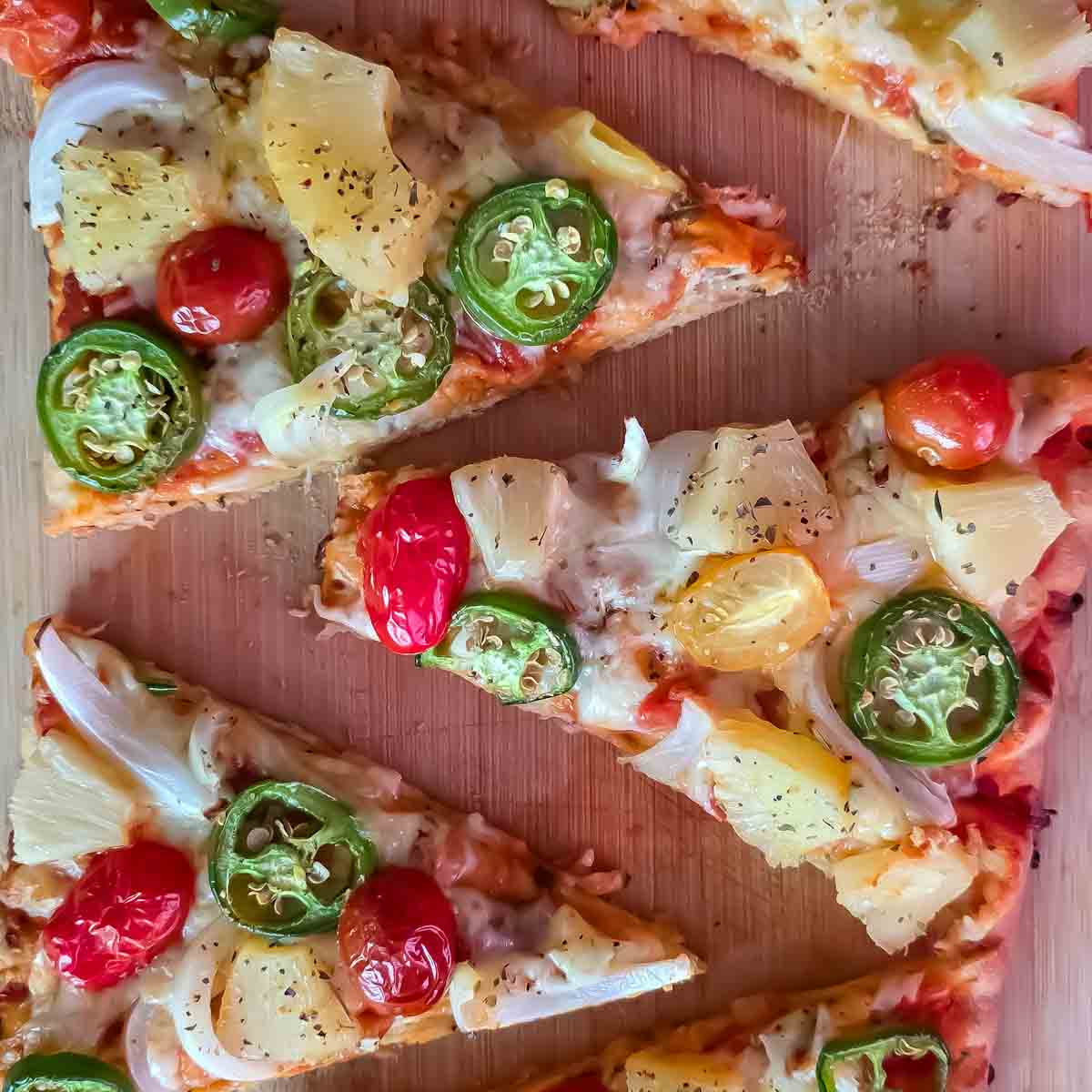 Sweet and spicy pineapple jalapeño pizza on flatbread served for an easy weeknight dinner.