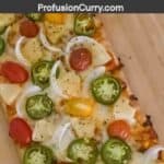 Easy vegetarian flatbread pizza made with store-bought flatbread, pineapple, and fresh jalapeños.
