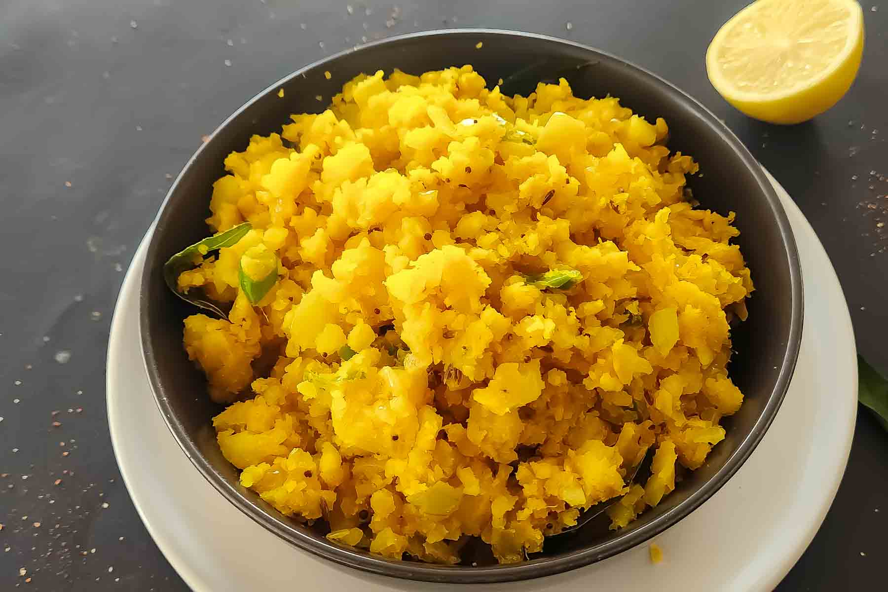 Vegan potato masala with curry leaves and mustard seeds.