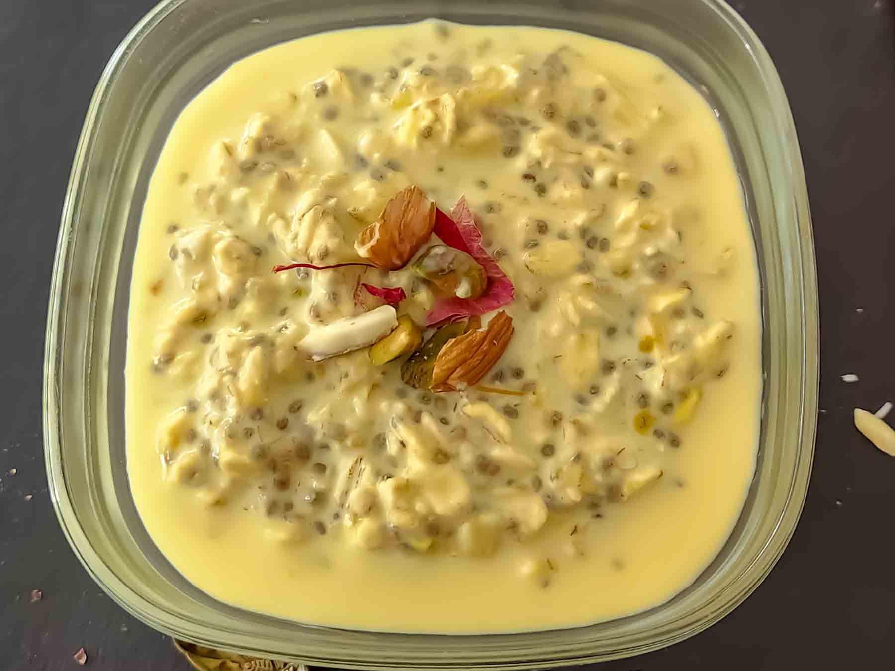 A bowl of sweet Indian flavored Overnight oats with chia seeds and saffron.