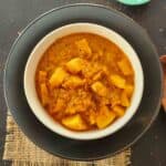 Vindaloo which is Goan Spicy curry made with potatoes and spicy tomato based sauce served for 20-minute curry dinner.