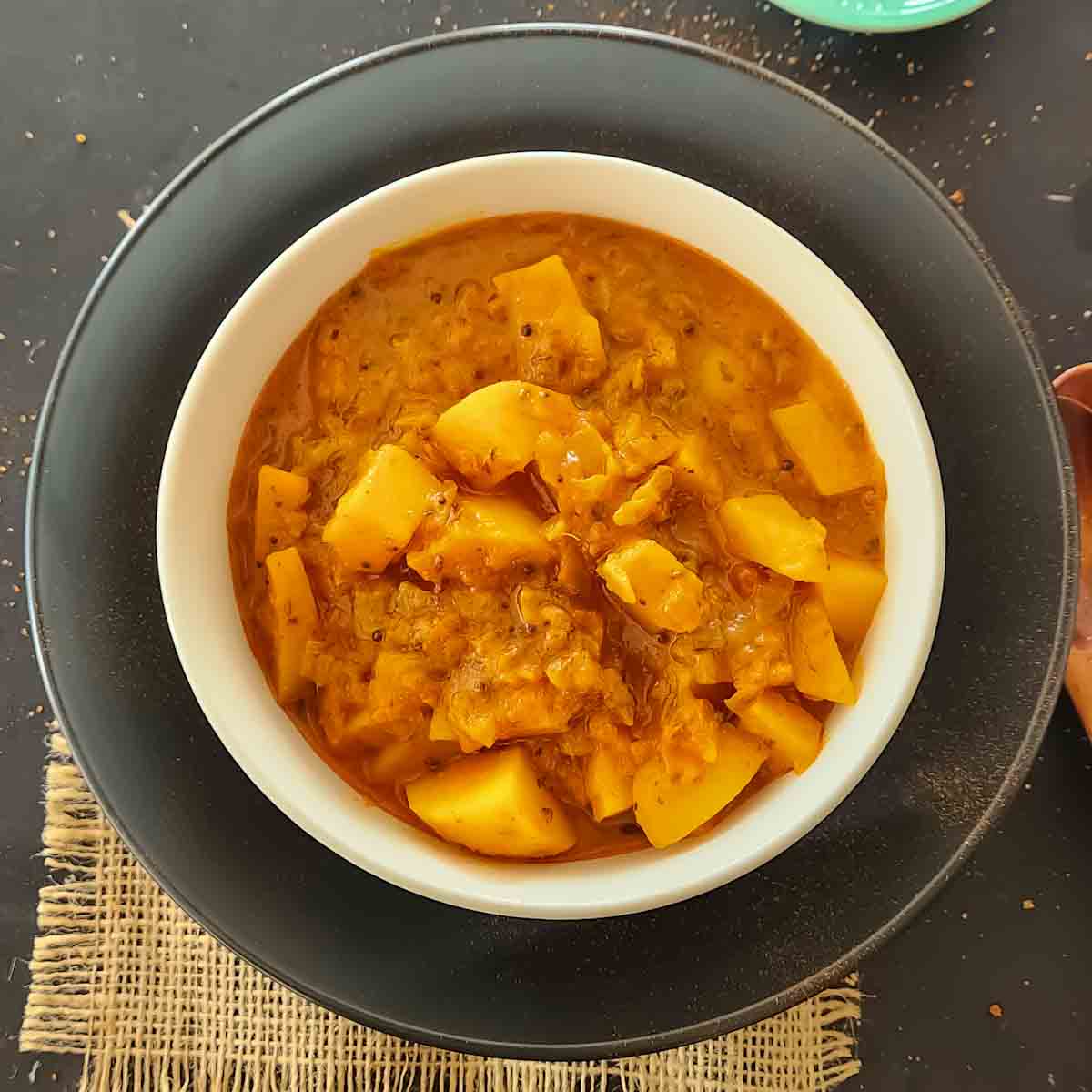 Vindaloo which is Goan Spicy curry made with potatoes and spicy tomato based sauce served for 20-minute curry dinner.
