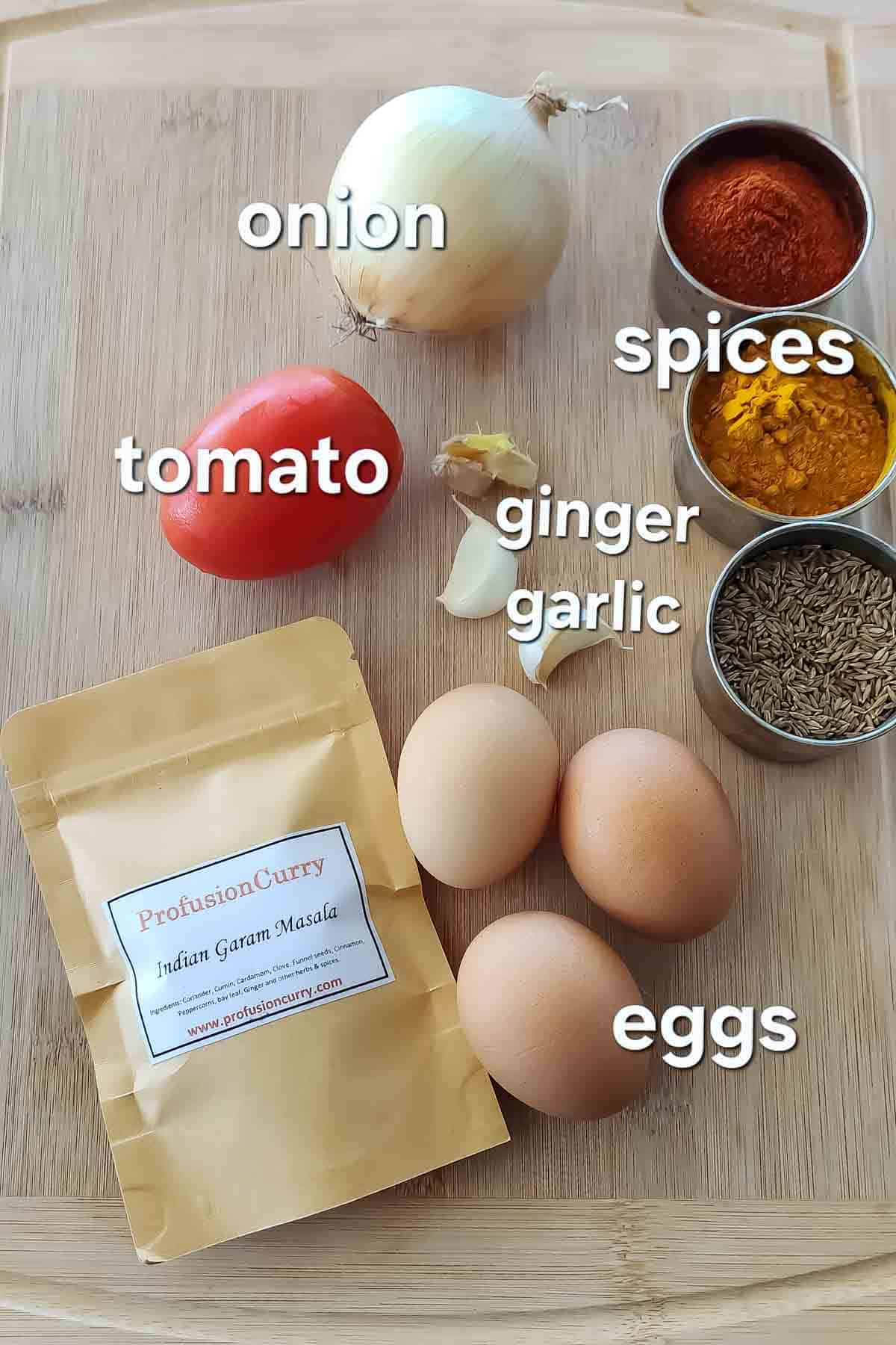 Ingredients used in making Indian Spiced Scrambled Eggs called Egg Bhurji or Anda Bhurji.