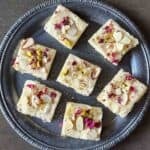 Easy white chocolate fudge recipe flavored with Indian inspired flavors of saffron and cardamom.