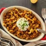 Easy vegan American goulash made with lentils, mushrooms, pasta, and tomato sauce for one pot comfort food.