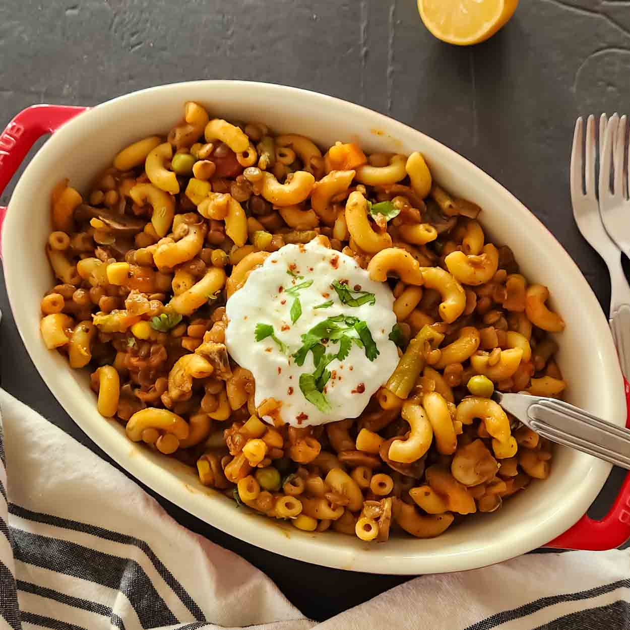 Easy vegan American goulash made with lentils, mushrooms, pasta, and tomato sauce for one pot comfort food.