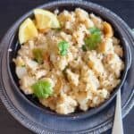 Homemade vegetable suji upma served for an Indian breakfast. suji upma, rava upma, sooji upma, semolina upma, Indian spiced cream of wheat, South Indian breakfast, easy Indian breakfast, and vegetable upma.