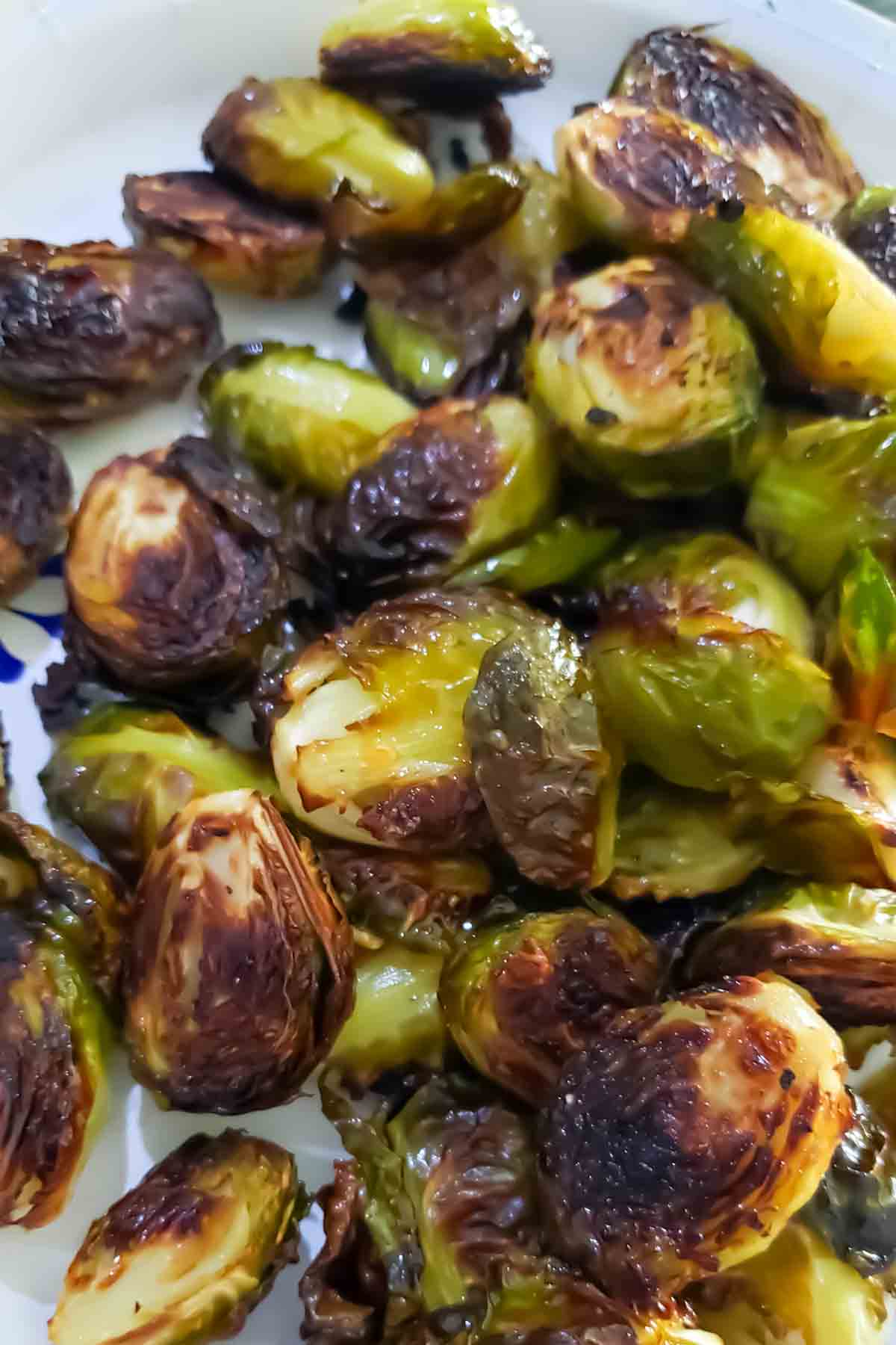 Crispy air fryer Brussels sprouts coated in maple balsamic glaze.
