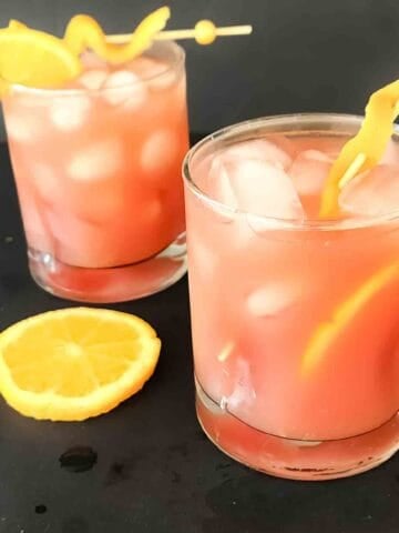 This Cranberry Orange Mocktail Recipe is refreshing, fizzy, and made with just 4 simple ingredients! Ready in just 5 minutes, this beautiful non-alcoholic cranberry drink is perfect for Christmas, Thanksgiving, Diwali, holiday parties, and family gatherings.
