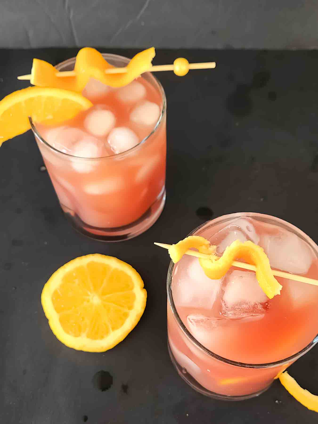 A refreshing, fizzy cranberry orange mocktail made with cranberry juice, orange juice, lemon juice, and ginger ale. This easy, alcohol-free drink is perfect for Christmas, Thanksgiving, Diwali, and holiday parties.
