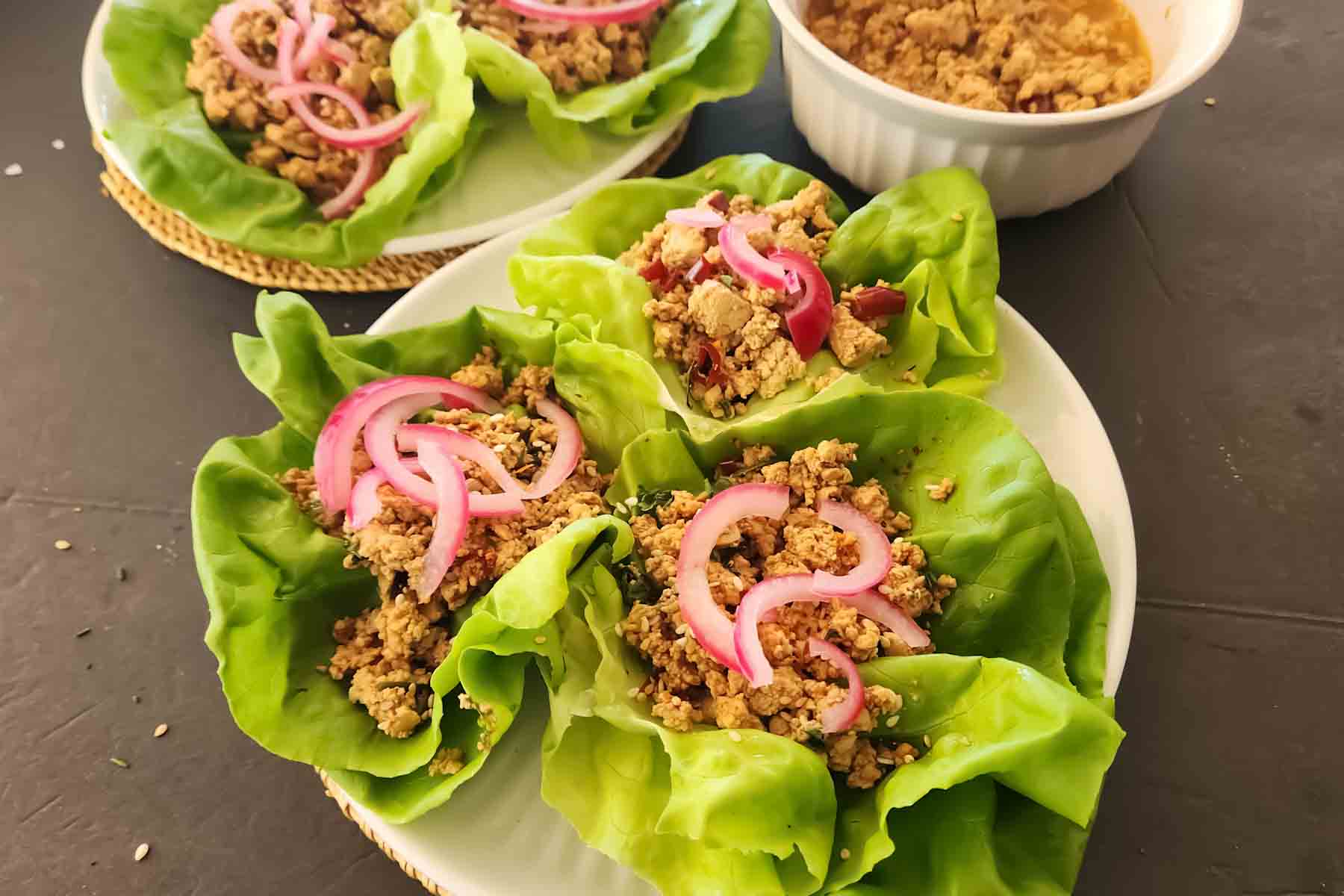 Easy Tofu Lettuce Wraps with Spicy Ginger Sauce made with vegan and gluten-free ingredients.