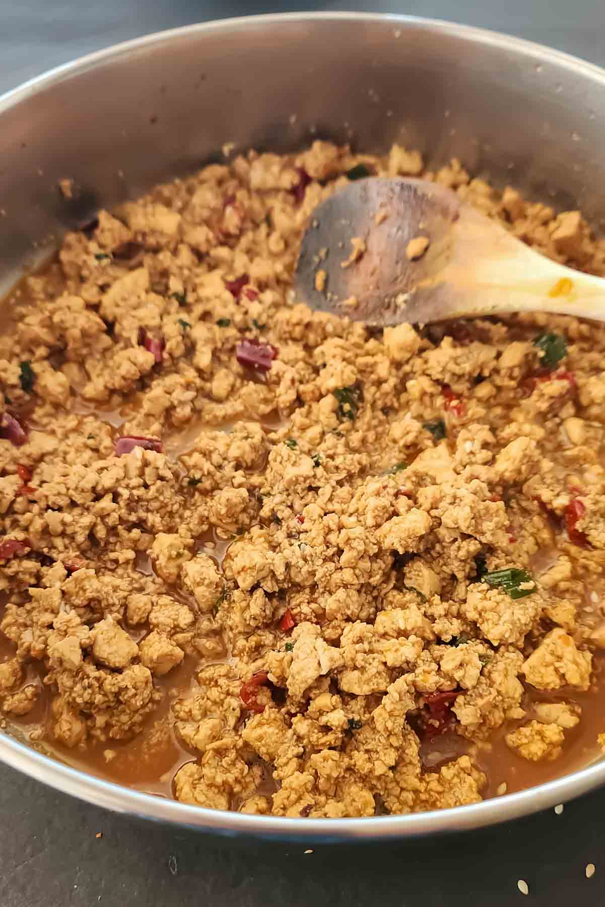 crumbled tofu with chili crisp for vegan Asian dinner.