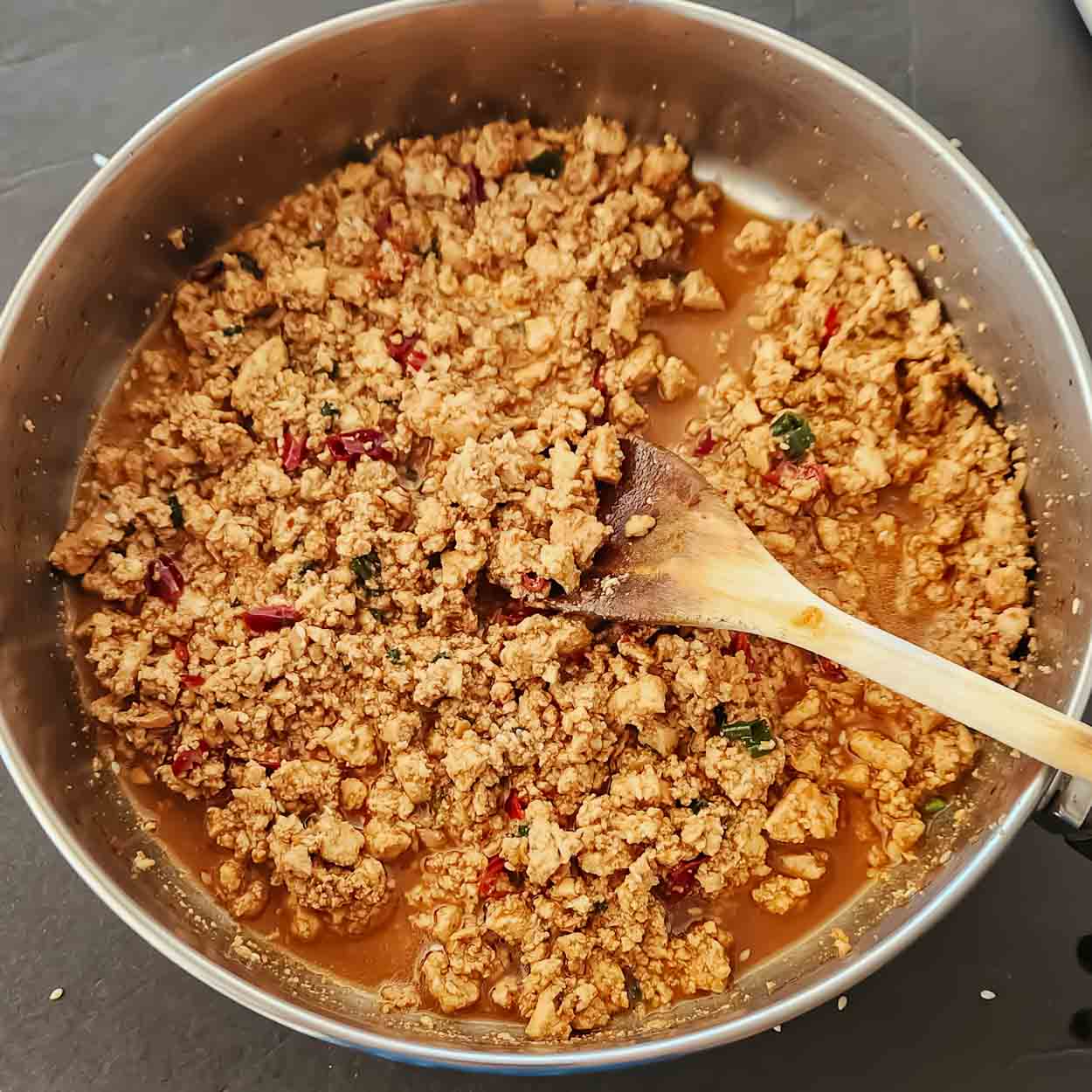 Make this easy ground tofu with chili crisp, tamari, garlic, and ginger. This spicy, savory tofu recipe is perfect for rice bowls, noodles, and quick weeknight dinners.